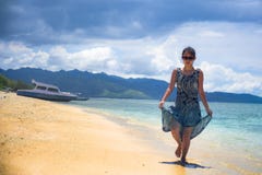 https://thumbs.dreamstime.com/t/young-relaxed-asian-chinese-woman-walking-thailand-island-beach-amazing-beautiful-turquoise-color-water-under-summer-106202163.jpg