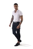 Young smiling man in white shirt and jeans isolated royalty free stock photos Young smiling man in white shirt and jeans isolated royalty free stock photos