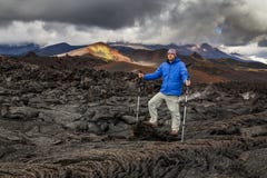 Young traveler on a background of volcanic rock. royalty free stock photos Young traveler on a background of volcanic rock. royalty free stock photos