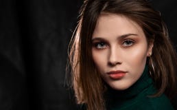 Young Woman with beautiful eyes, Face shot on Dark Grey Background royalty free stock photos Young Woman with beautiful eyes, Face shot on Dark Grey Background royalty free stock photos