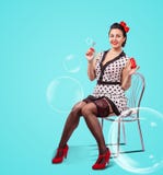 Young Woman Blowing Bubbles Indoor Stock Photos