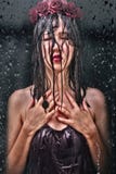 Young woman, closed eye wet black hair