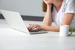 Young woman with computer indoors royalty free stock image Young woman with computer indoors royalty free stock image