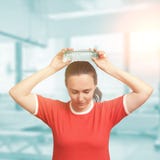 Young woman cool down after workout with cold water bottle. Eyes Royalty Free Stock Image Young woman cool down after workout with cold water bottle. Eyes Royalty Free Stock Image