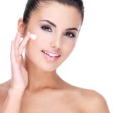 Young woman with cosmetic cream on face royalty free stock images Young woman with cosmetic cream on face royalty free stock images