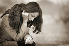 Young Woman Crying Outdoors in the Dark Autumn Day stock photography Young Woman Crying Outdoors in the Dark Autumn Day stock photography