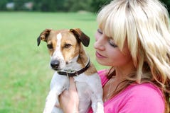 Young woman with dog stock photography Young woman with dog stock photography