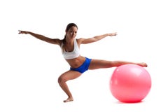 Young Woman Doing Split With Fitness Ball Isolated Stock Image