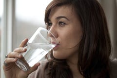 Young Woman Drinking Water Royalty Free Stock Image