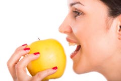 Young woman eating apple royalty free stock images Young woman eating apple royalty free stock images