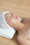 A young woman enjoying massage royalty free stock photography A young woman enjoying massage royalty free stock photography