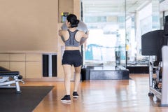 Young woman exercising with a yoga ball Royalty Free Stock Photos Young woman exercising with a yoga ball Royalty Free Stock Photos