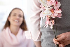 Young Woman Getting Flowers From Boyfriend Stock Images Young Woman Getting Flowers From Boyfriend Stock Images
