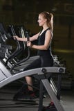Young woman at the gym exercising. Run on machine. stock images Young woman at the gym exercising. Run on machine. stock images