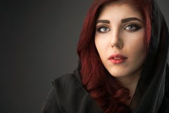 Young woman with head covered by a black veil Stock Photography Young woman with head covered by a black veil Stock Photography