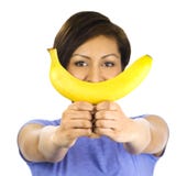 Young Woman Holds A Banana Royalty Free Stock Photography