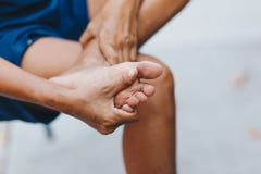 Young woman pain in her foot royalty free stock image Young woman pain in her foot royalty free stock image
