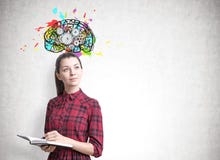 Young woman with a planner, brain cogs royalty free stock image Young woman with a planner, brain cogs royalty free stock image