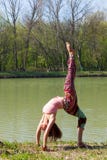Young woman practice yoga outdoor by the lake healthy lifestyle concept full body shot royalty free stock photography Young woman practice yoga outdoor by the lake healthy lifestyle concept full body shot royalty free stock photography