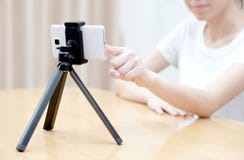 Woman recording content for her blog Stock Images Woman recording content for her blog Stock Images