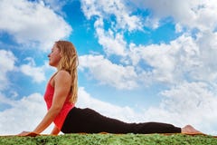 Young woman show cobra yoga pose perfectly stock image Young woman show cobra yoga pose perfectly stock image