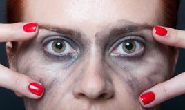 Young woman showing her eyes in closeup stock photography Young woman showing her eyes in closeup stock photography
