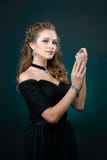 Young woman showing off her jewelery in fashion concept wearing royalty free stock image Young woman showing off her jewelery in fashion concept wearing royalty free stock image