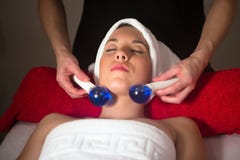 Young woman in spa having face massage stock images Young woman in spa having face massage stock images