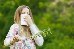 Young woman suffering spring pollen allergy Royalty Free Stock Photography Young woman suffering spring pollen allergy Royalty Free Stock Photography