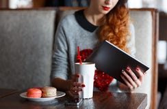 Young woman with tablet computer in cafe stock images Young woman with tablet computer in cafe stock images