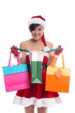 Young woman take shopping bags with happy smile face isolated over white background, model is a asian girl stock image Young woman take shopping bags with happy smile face isolated over white background, model is a asian girl stock image