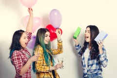 Young woman taking a picture of pretty girl, white background stock photos Young woman taking a picture of pretty girl, white background stock photos