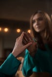 Young woman touching her own reflection in a mirror royalty free stock photo Young woman touching her own reflection in a mirror royalty free stock photo