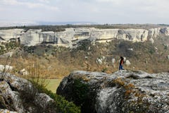 Young woman traveling in the mountains, cave cities, hiking, walking in the mountains stock photo Young woman traveling in the mountains, cave cities, hiking, walking in the mountains stock photo