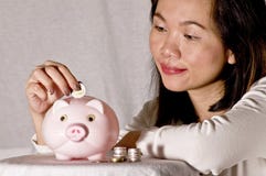 Young Woman With Pink Piggy Bank Royalty Free Stock Photo