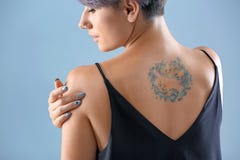 Young Woman With Tattoo Royalty Free Stock Images