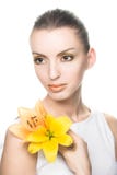 Young Woman With Yellow Flowers Royalty Free Stock Photos