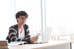 Young woman working with mobile phone stock photos Young woman working with mobile phone stock photos