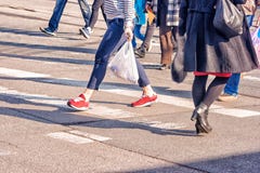 Young Women Feet, Crossing An Urban Street Royalty Free Stock Photos Young Women Feet, Crossing An Urban Street Royalty Free Stock Photos