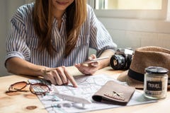 Young women traveler planning vacation trip Royalty Free Stock Photo Young women traveler planning vacation trip Royalty Free Stock Photo