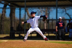 Youth baseball pitcher in wind up Royalty Free Stock Images Youth baseball pitcher in wind up Royalty Free Stock Images