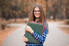 Youthful positive cheerful confident energetic female college student on way to class royalty free stock images Youthful positive cheerful confident energetic female college student on way to class royalty free stock images