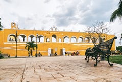 YUCATAN, MEXICO - MAY 31, 2015: Facade of the church view from the park royalty free stock photo YUCATAN, MEXICO - MAY 31, 2015: Facade of the church view from the park royalty free stock photo
