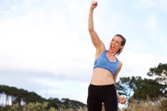 Z podnieceniem sport kobiety doping z rękami podnosić zdjęcie royalty free Z podnieceniem sport kobiety doping z rękami podnosić zdjęcie royalty free