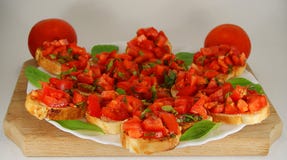 Z pomidorami włoski Bruschetta fotografia royalty free Z pomidorami włoski Bruschetta fotografia royalty free