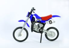 Zabawkarski motocykl nad białym tłem zdjęcie royalty free Zabawkarski motocykl nad białym tłem zdjęcie royalty free