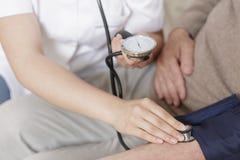 zabrać pielęgniarki ciśnienia krwi obraz stock zabrać pielęgniarki ciśnienia krwi obraz stock