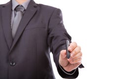 Zakenman die op exemplaarruimte schrijven tegen stock afbeeldingen Zakenman die op exemplaarruimte schrijven tegen stock afbeeldingen
