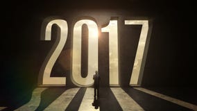 Zakenman die zich voor typo 2017 op de zwarte muur bevinden vector illustratie Zakenman die zich voor typo 2017 op de zwarte muur bevinden vector illustratie