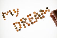Zakończenie męska ręka robi up zwrotowi Mój sen robić seashells na białym tle Pojęcie odpoczynek lub wakacje Iso zdjęcia royalty free Zakończenie męska ręka robi up zwrotowi Mój sen robić seashells na białym tle Pojęcie odpoczynek lub wakacje Iso zdjęcia royalty free